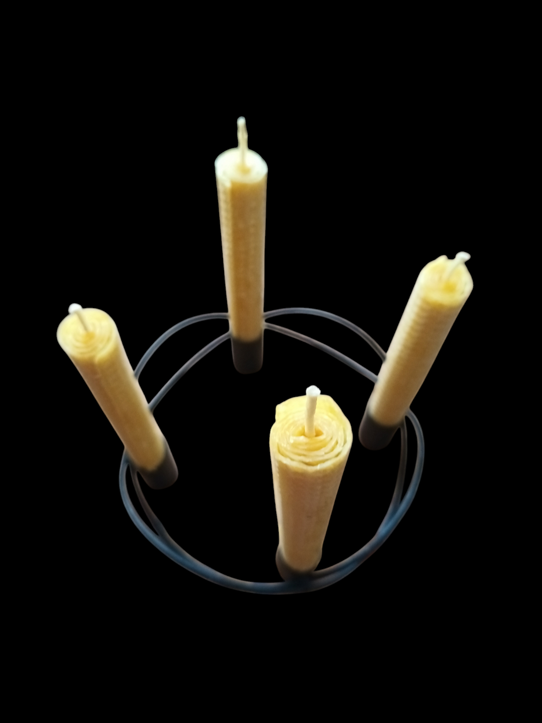 4 candles in holder